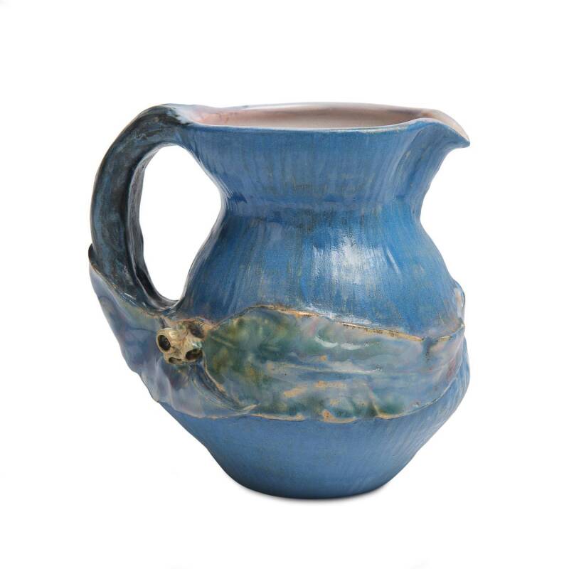 Philippa James (1893-1967) A glazed earthenware gumnut and gum leaf blue glazed jug