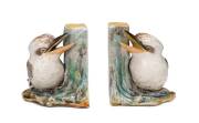 Grace Seccombe (1880-1956) A pair of glazed earthenware kookaburra bookends