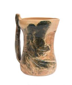 William Merric (Merric) Boyd (1888-1959) A glazed earthenware landscape incised branch handled jug