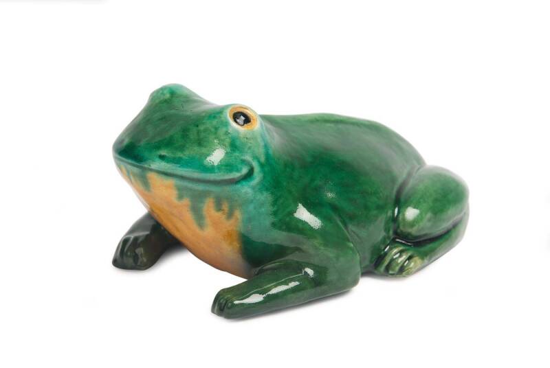 Grace Seccombe (1880-1956) "Freddie" A glazed earthenware figure of a green frog