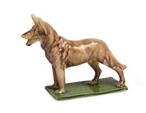 Bosley A glazed earthenware figure of a dog