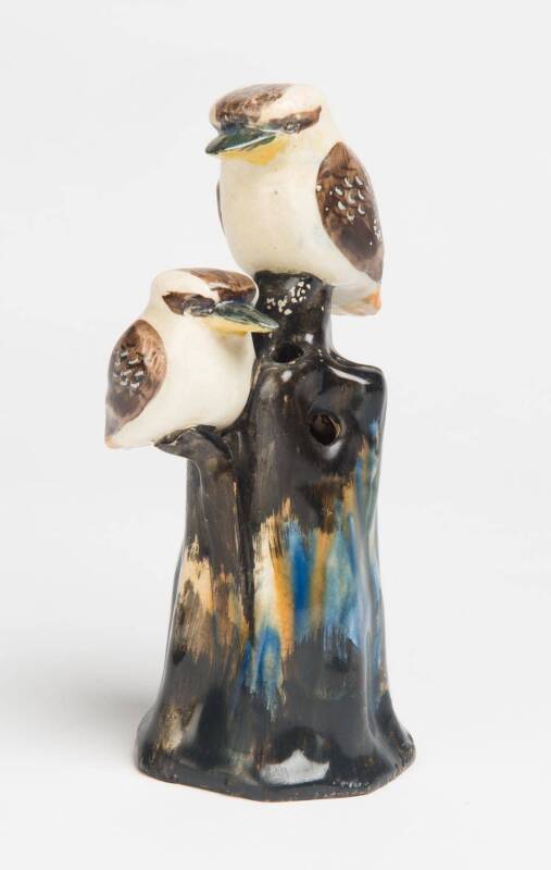 Grace Seccombe (1880-1956) A glazed earthenware figure of two kookaburras on a pierced flower frog base