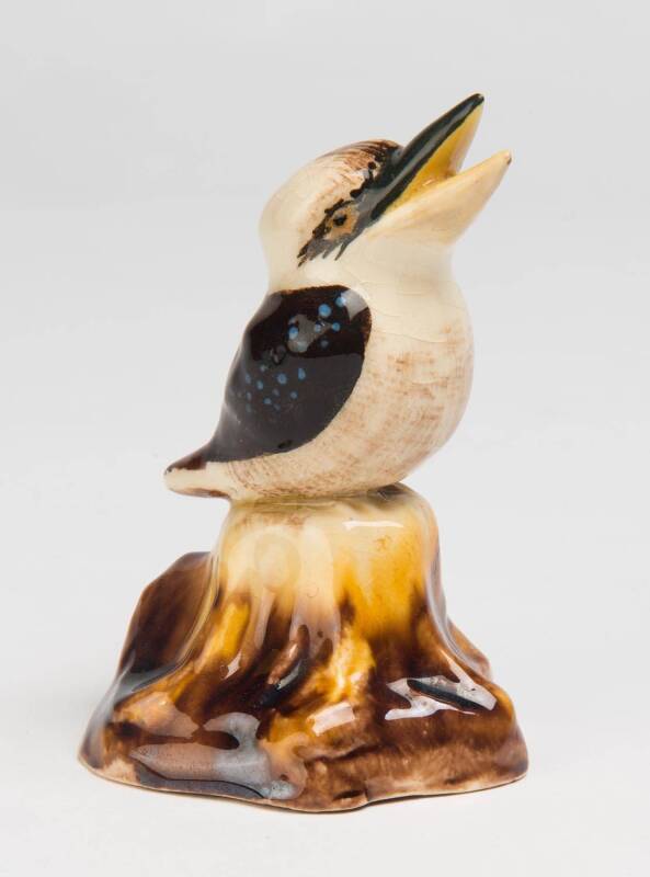 Grace Seccombe (1880-1956) A small glazed earthenware figure of a open beak kookaburra