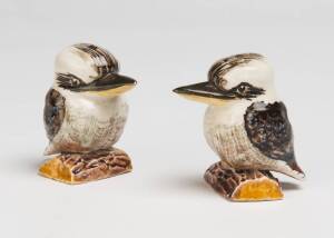 Grace Seccombe (1880-1956) A pair of glazed earthenware kookaburra salt and pepper shakers