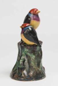 Grace Seccombe (1880-1956) A glazed earthenware figure of two baby finches