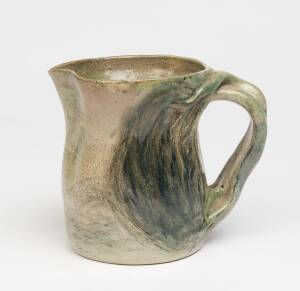 William Merric (Merric) Boyd (1888-1959) A glazed earthenware relief moulded tree jug