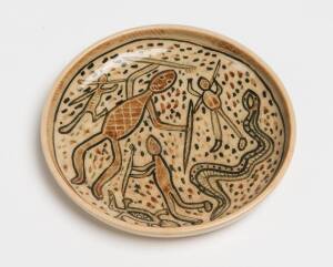 Carl Cooper (1917-1968) A slip cast glazed earthenware dish with painted decoration of figures