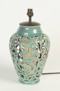 Klytie Pate (1912-2010) A wheel thrown blue glazed earthenware pierced lamp base decorated with gum leaves
