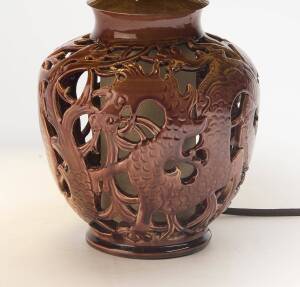 Klytie Pate (1912-2010) A wheel thrown glazed earthenware pierced lamp base decorated with dragons circa 1950