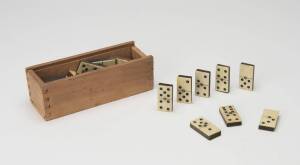 Set of miniature dominoes in wooden case, whalebone and ebony, 19th Century.