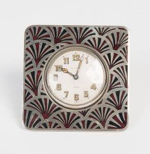 An Art Deco enameled nickel traveling clock