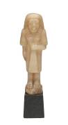 Egyptian carved alabaster figure, New Kingdom with remains of paper label on the base (illegible), 1400-1200 B.C. Statue not including base, 19cm