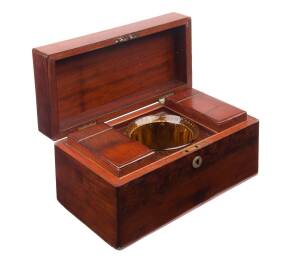 A Regency mahogany tea caddy with two cannisters and later amber glass mixing bowl, early 19th Century. 18cm high, 15cm wide, 15cm deep