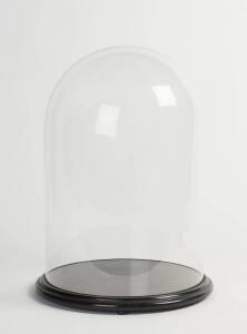 A large glass dome and base, 19th Century. 58cm high, 38cm diameter