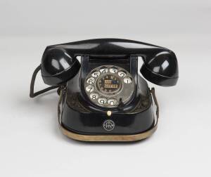 An early metal cased telephone by "Bell Phones M.F.G. Company", Belgium, early 20th Century