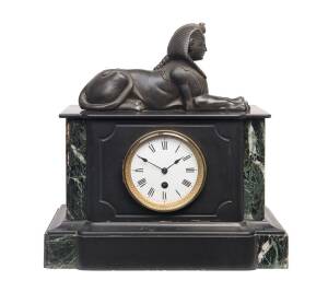 A French mantel clock, black slate and verte marble adorned with spelter sphinx, 19th Century. 35cm high, 34cm wide, 17cm deep