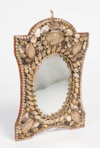 A small shell encrusted mirror. 34cm high, 24cm wide