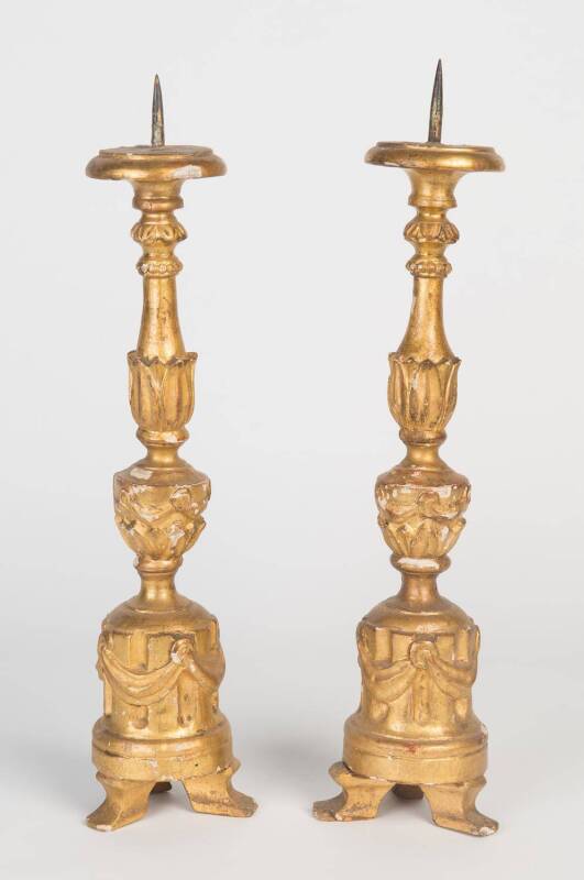 A pair of gilt candle stands, Italian. 44cm high