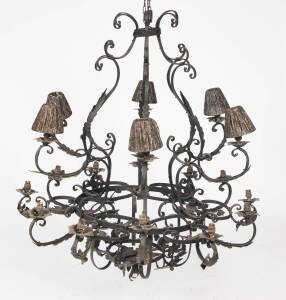 A large French provincial style wrought iron chandelier