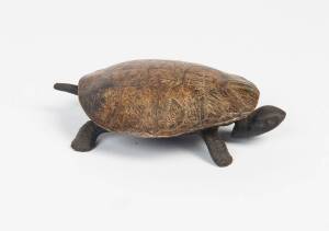 A Vintage clockwork toy with nodding head and tail made from tortoise shell. 18cm wide. ♦