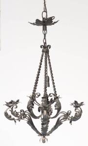 A French provincial style six light wrought iron chandlier