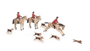 A set of Victorian carved and painted wood "fox hunt" toys, with three hunters on horse back, six hounds and a fox. Tallest 12cm