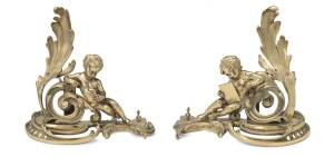 A fine pair of Andirons decorated with gilt bronze cherubs, French, 19th Century. 34cm