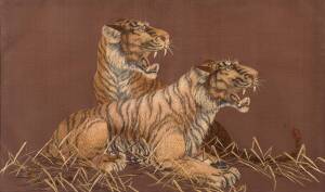 A framed Chinese silk embroidery of tigers, 20th Century. 51.5x30cm