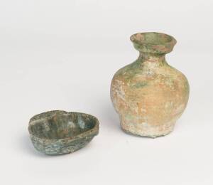 A Chinese green glazed ear cup, Han Dynasty (206BC-220AD), 11 x 9.8cm; together with a green glazed jar, 16cm high.Provenance: The Dr. Steven Zador Collection.