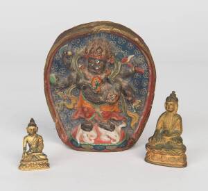 Two miniature gilt bronze figures of Buddha, together with a coloured clay Mahakala, 20th Century. 3.5cm, 5.5cm and 11cm high