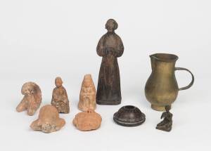 A group of 7 South East Asian pottery figures, 6-24cm high; together with one Thai vessel and one metal mug, 5-15cm high. (9 items)