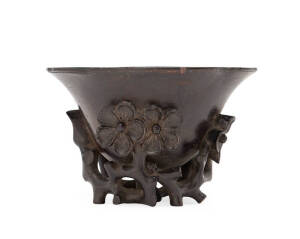 Chinese zitan libation cup with floral motif, 19th century. Provence: Dr Cec English. Height 7cm.
