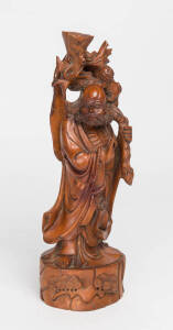Chinese boxwood carving of a sage, early 20th Century. 34cm.