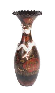 A monumental Japanese ceramic floor vase with applied dragon decoration. 92cm high