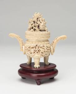 A Chinese carved ivory censor with dragon lid on wooden stand, 20th Century. Ivory 10.5cm. &diams;