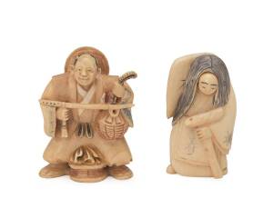 Two Japanese Ivory figure netsuke, one with revolving face, Meiji Period. 5cm each. &diams;