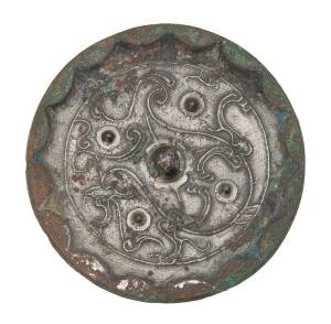 A Chinese bronze mirror, possibly Han Dynasty (206BC-220AD), 10cm diameter