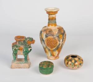 A group of three "sancai" glazed vessels including one vase, one covered box and one jar; together with a "sancai" glazed candlestick, 4.5cm-26.5cm high&nbsp;