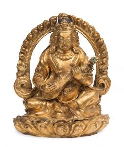 A Nepalese gilt bronze repousse figure of a music Buddha, early 20th Century.&nbsp;27cm&nbsp;&nbsp;