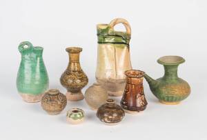 A group of stoneware jarlets and two dark glazed vases, two stoneware "hu" vessels and one green glazed kandi, 3.5cm-22cm high