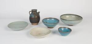 A group of three Junyao style bowls and a Junyao style ewer, 20th Century, together with one celadon dish and one white glaze dish, bowls:11.5cm -23.5cm diameter; ewer: 16cm high and dishes: 18cm and 20 cm diameter