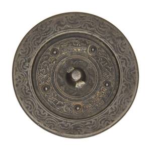 A Chinese bronze mirror, 18th Century. 10.3cm