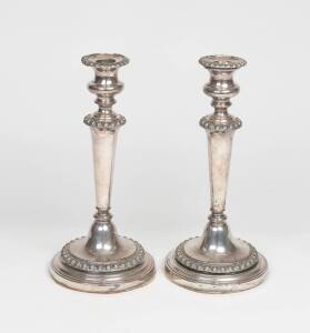 A pair of Sheffield plated candlesticks, 19th Century. 29cm