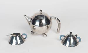 A bulbous tea pot and an Alessi sugar bowl and milk jug