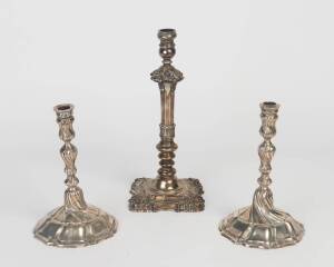 A German silver pair of candlesticks, circa 1900, 23 cm high, 700 grams; and a silver plated candlestick, 33 cm high