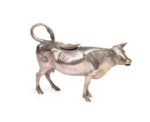 A large Continental silver cow creamer, circa 1900. 27 cm long, 600 grams