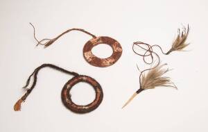 Two Tiwi Islands arm bands, natural earth pigments and fibre, mid 20th Century. 12cm diameter