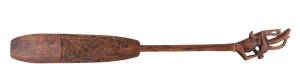 A tribal paddle, carved wood, mid 20th Century. 130cm