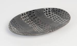 An African pottery black and white geometric design oval bowl, 36 x 26 cm