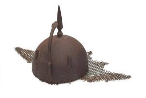 A Persian style metal helmet with chain mesh neck guard. Late 19th early 20th Century. 42cm